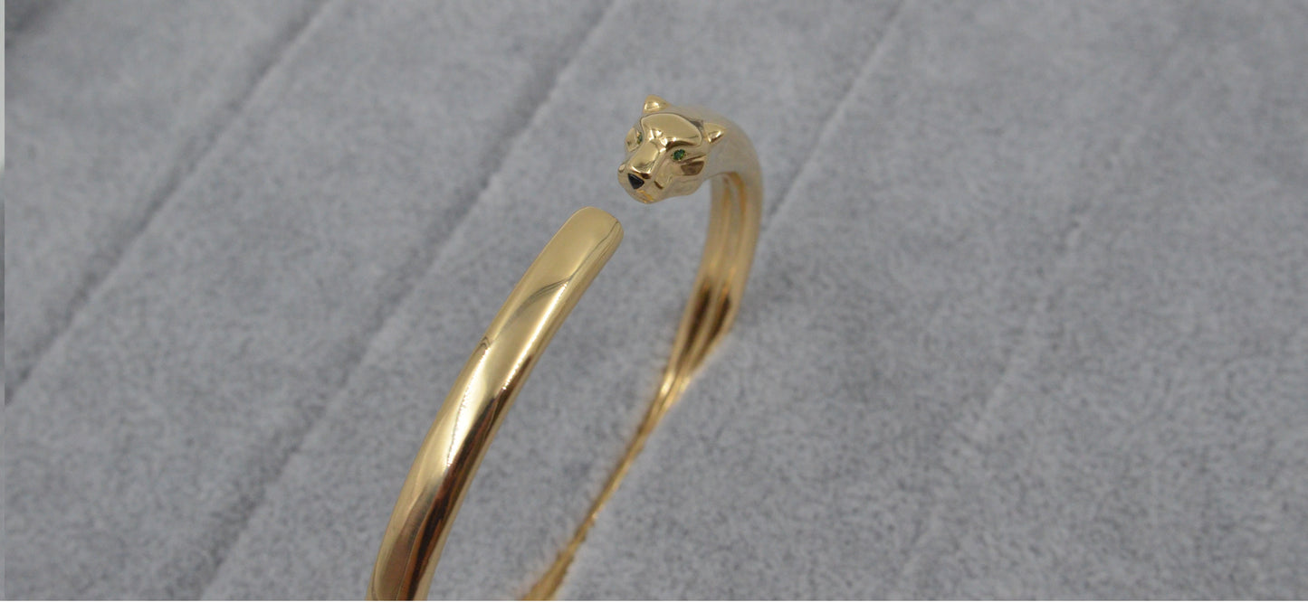 Auksinė apyrankė pantera