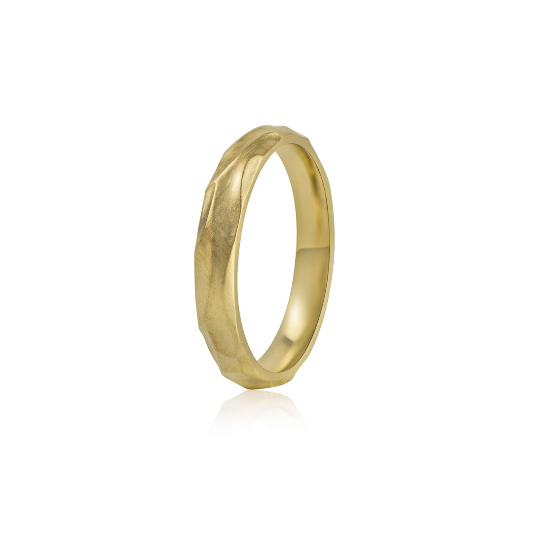 minimalistiniai geltono aukso ziedai su iskalta tekstura ant balto fono